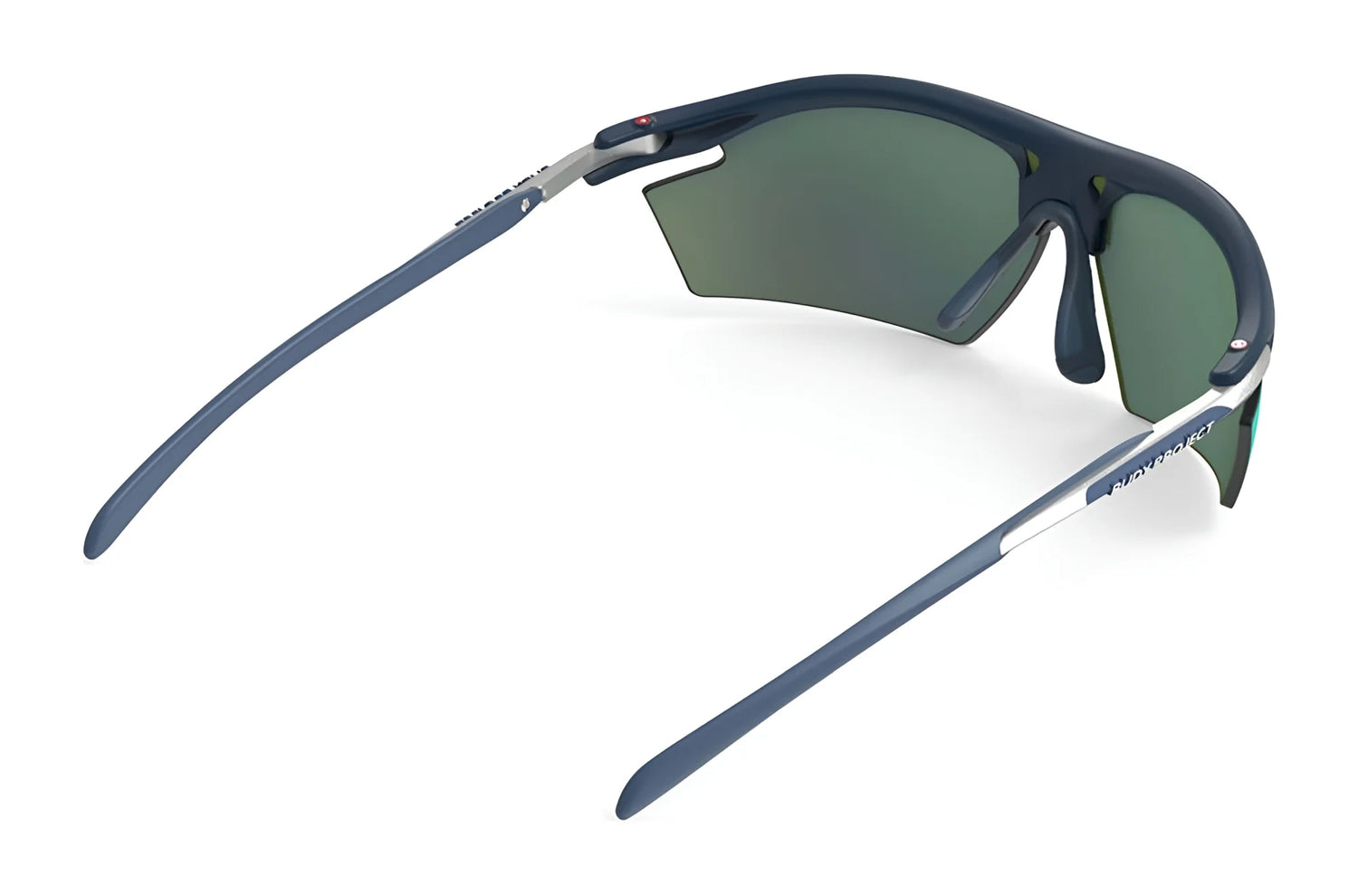 Rudy Project Rydon Sunglasses by Rudy Project in dark blue, shown from the back left with green lenses and adjustable anti-slip nosepads for a secure fit. Rudy Project Rydon Sunglasses by Rudy Project in dark blue, shown from the back left with green lenses and adjustable anti-slip nosepads for a secure fit.