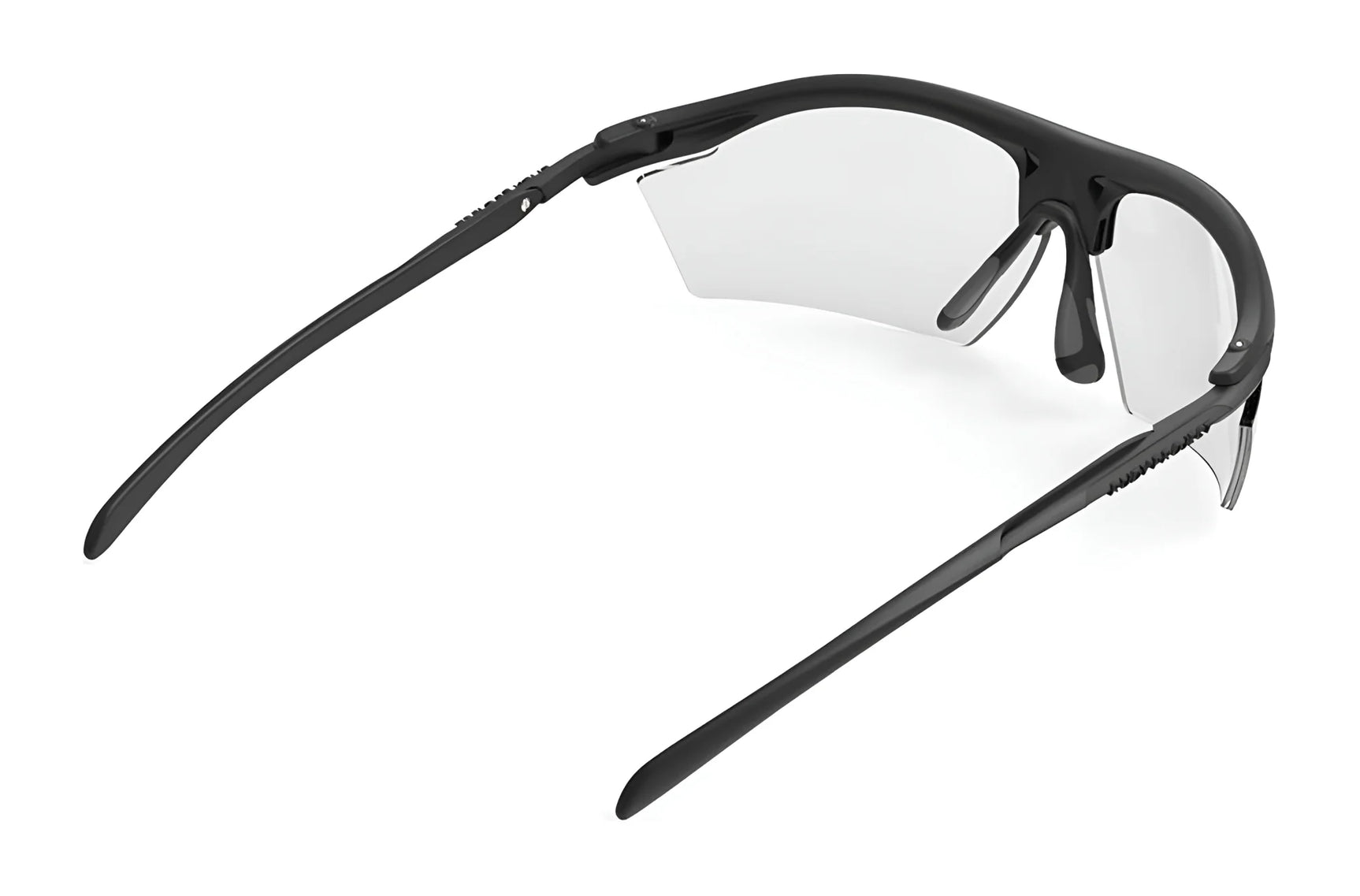 Rudy Project Rydon Safety Glasses in size 71 by Rudy Project, shown with a black frame and clear lenses, are viewed from the back and slightly above on a white background. These glasses provide versatile protection for active lifestyles. Rudy Project Rydon Safety Glasses in size 71 by Rudy Project, shown with a black frame and clear lenses, are viewed from the back and slightly above on a white background. These glasses provide versatile protection for active lifestyles.