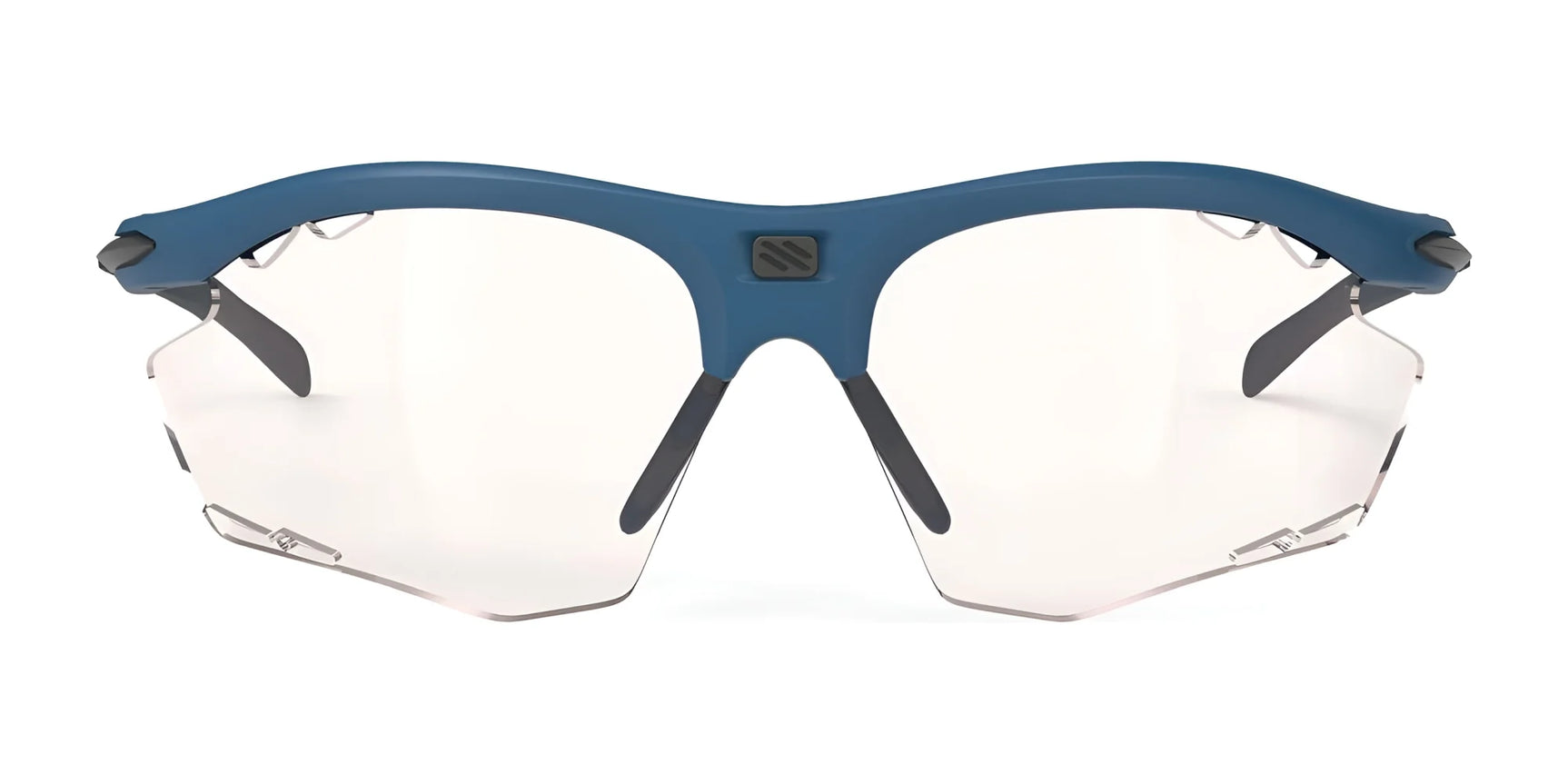 The Rudy Project Rydon Sunglasses by Rudy Project are blue-framed, rimless sports sunglasses with clear lenses, shown from the front and featuring adjustable anti-slip nosepads for a secure fit. The Rudy Project Rydon Sunglasses by Rudy Project are blue-framed, rimless sports sunglasses with clear lenses, shown from the front and featuring adjustable anti-slip nosepads for a secure fit.