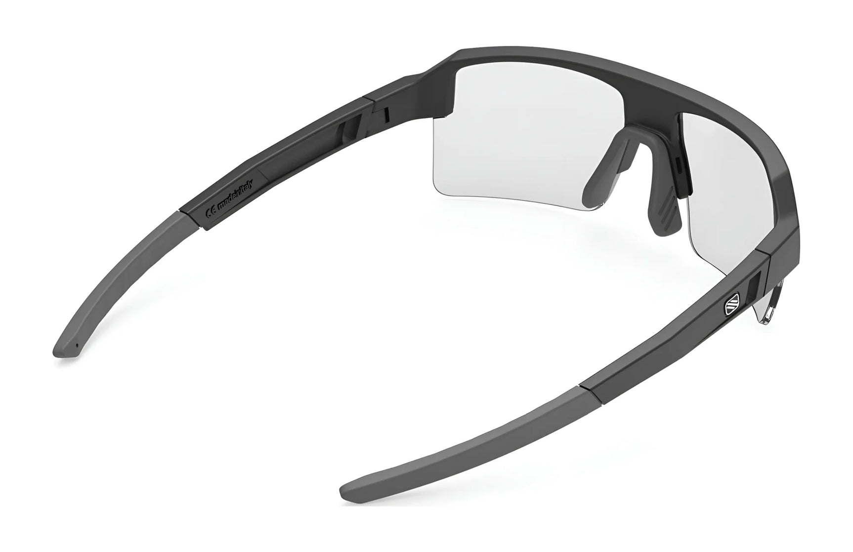 Rudy Project Sirius Sunglasses | Size 50 by Rudy Project feature a wide, angular black frame made from sustainable materials, shown from a rear side angle with clear lenses for eco-friendly style. Rudy Project Sirius Sunglasses | Size 50 by Rudy Project feature a wide, angular black frame made from sustainable materials, shown from a rear side angle with clear lenses for eco-friendly style.