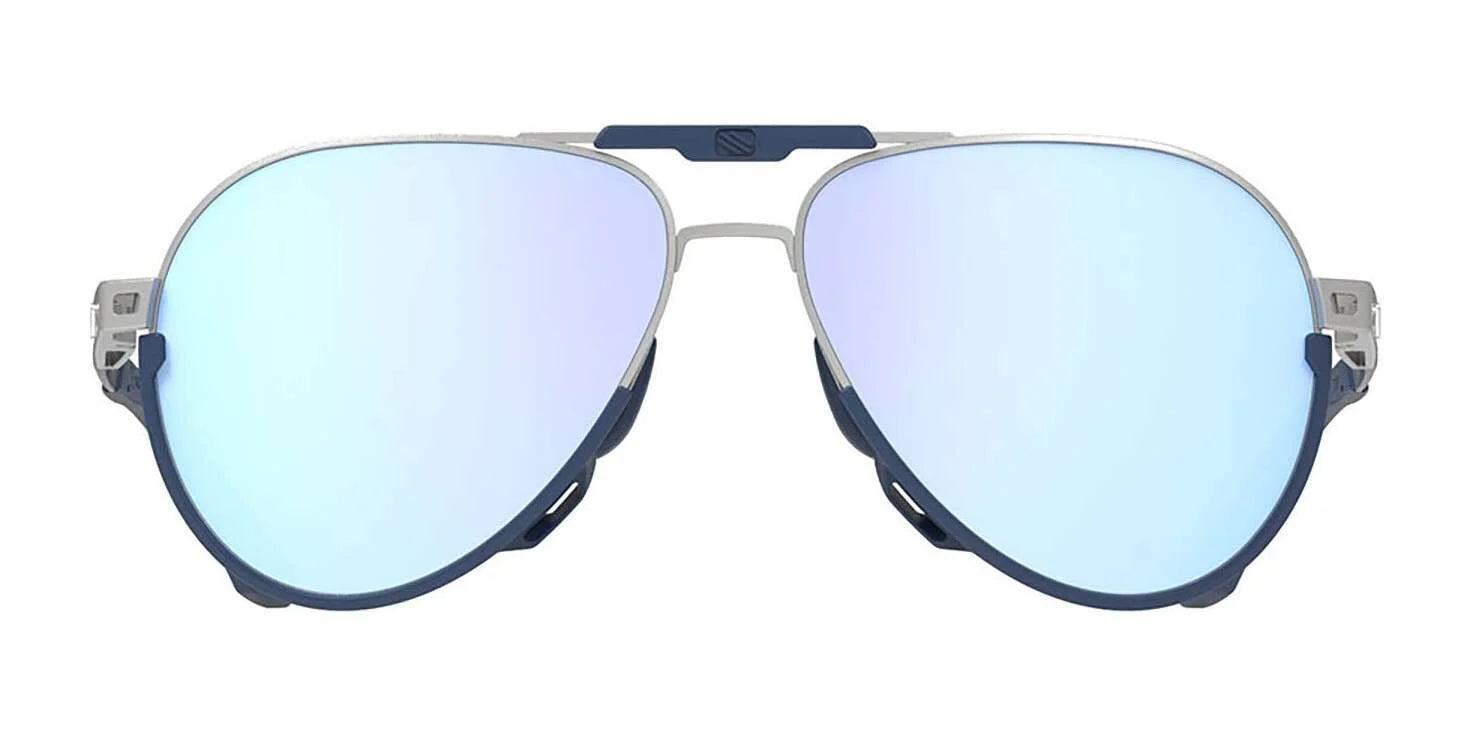 Rudy Project Skytrail Sunglasses | Size 58 feature a silver metal frame, blue mirrored lenses, blue accents on the bridge and edges, plus adjustable temple tips for comfort. Rudy Project Skytrail Sunglasses | Size 58 feature a silver metal frame, blue mirrored lenses, blue accents on the bridge and edges, plus adjustable temple tips for comfort.