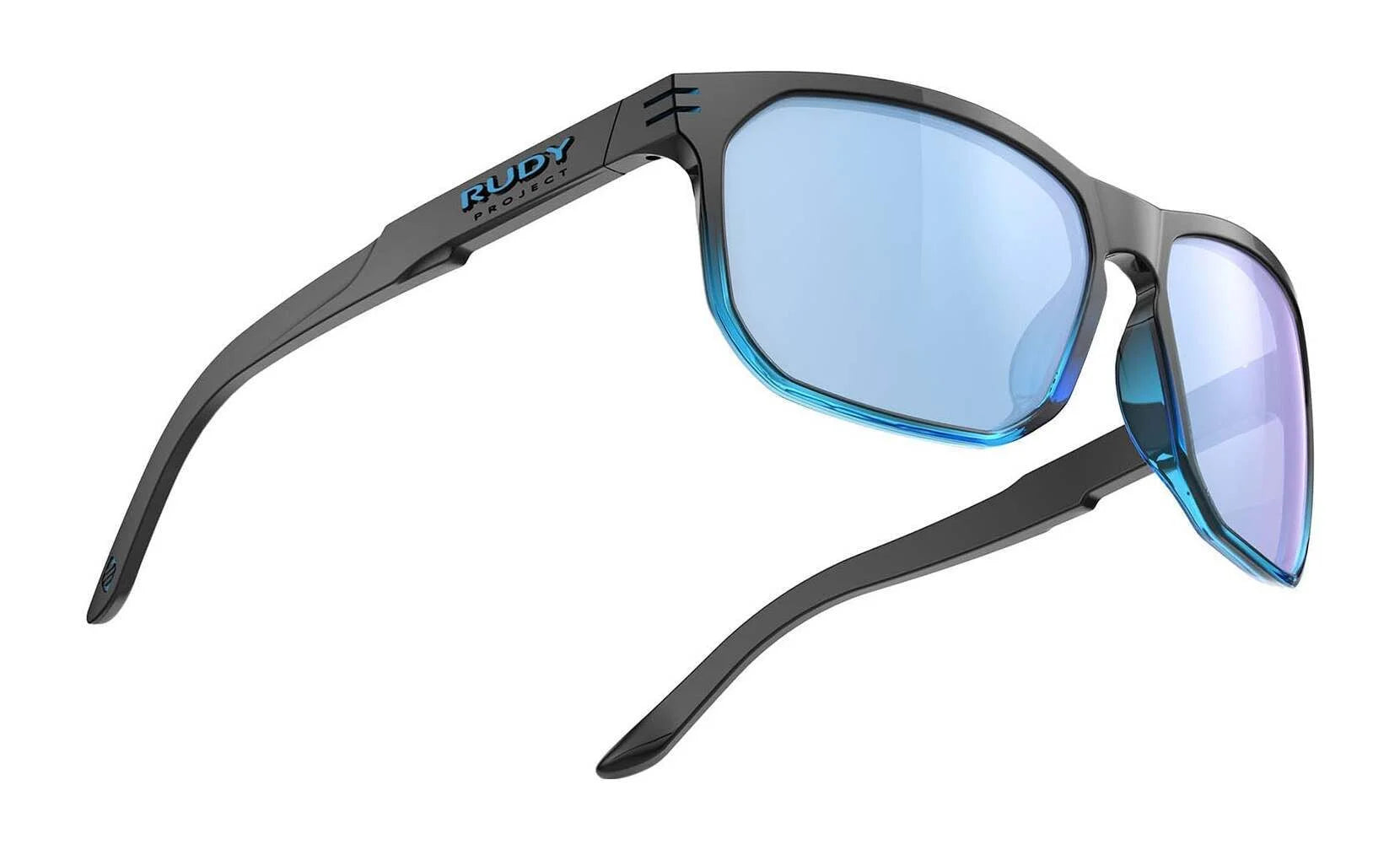 Rudy Project Soundrise Sunglasses | Size 62, in black and blue with reflective blue lenses, by Rudy Project. Designed for active lifestyles. Displayed on a white background. Rudy Project Soundrise Sunglasses | Size 62, in black and blue with reflective blue lenses, by Rudy Project. Designed for active lifestyles. Displayed on a white background.