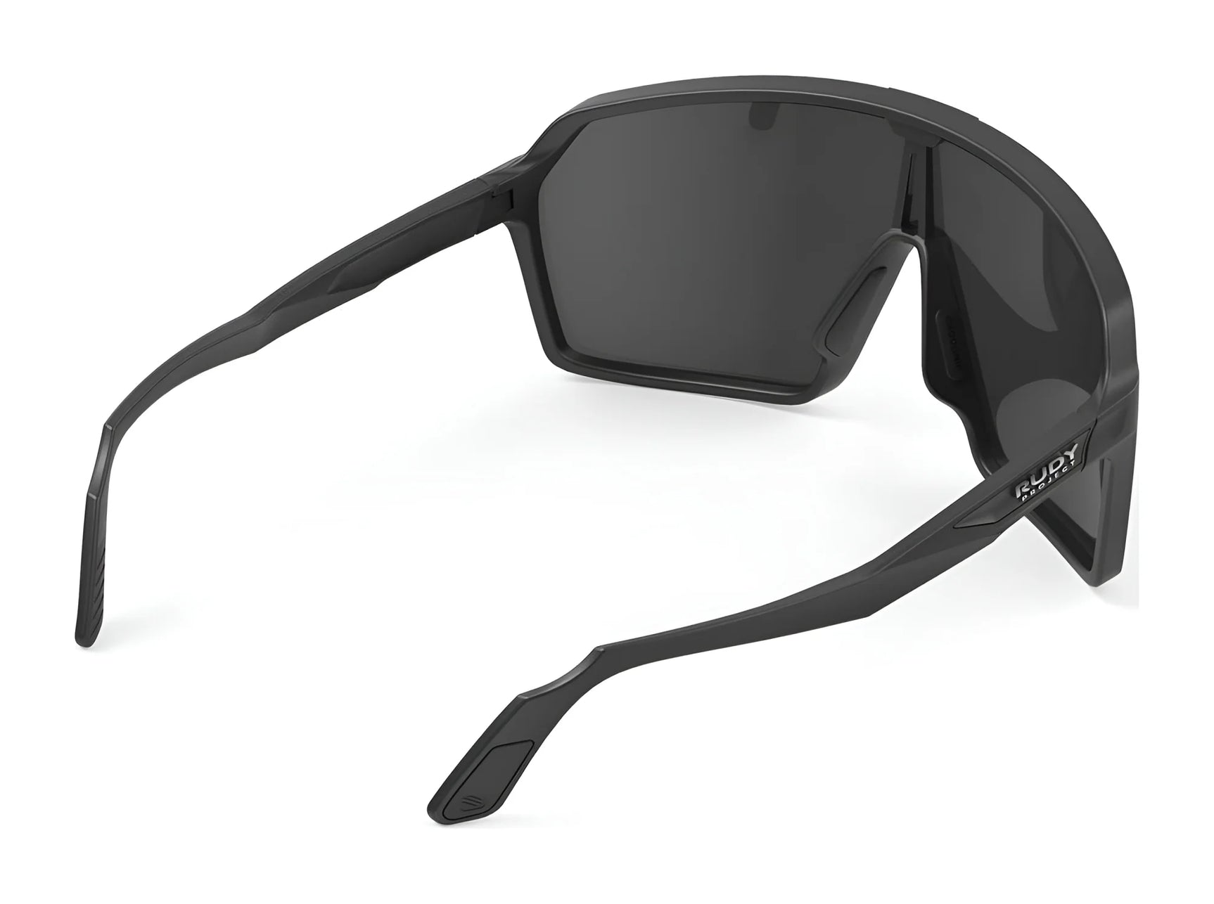 Rudy Project Spinshield Sunglasses (Size 147) feature wide, angular frames and dark lenses, shown from a rear side angle—ideal cycling sunglasses for eye protection on every ride. Rudy Project Spinshield Sunglasses (Size 147) feature wide, angular frames and dark lenses, shown from a rear side angle—ideal cycling sunglasses for eye protection on every ride.