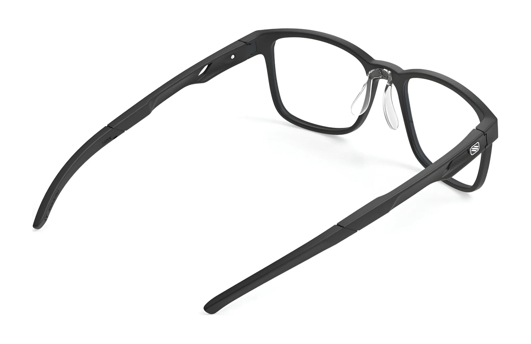 Rudy Project Step 01 Eyeglasses (Size 51) feature a black rectangular frame with clear nose pads and adjustable temple tips, displayed from a rear angled view on white. Prescription ready for convenience. Rudy Project Step 01 Eyeglasses (Size 51) feature a black rectangular frame with clear nose pads and adjustable temple tips, displayed from a rear angled view on white. Prescription ready for convenience.
