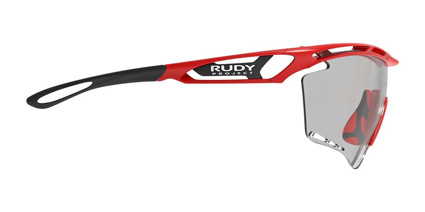 Rudy Project Tralyx Sunglasses in red and black, featuring a single clear ImpactX-2 lens and PowerFlow ventilation, displayed from the side. Rudy Project Tralyx Sunglasses in red and black, featuring a single clear ImpactX-2 lens and PowerFlow ventilation, displayed from the side.