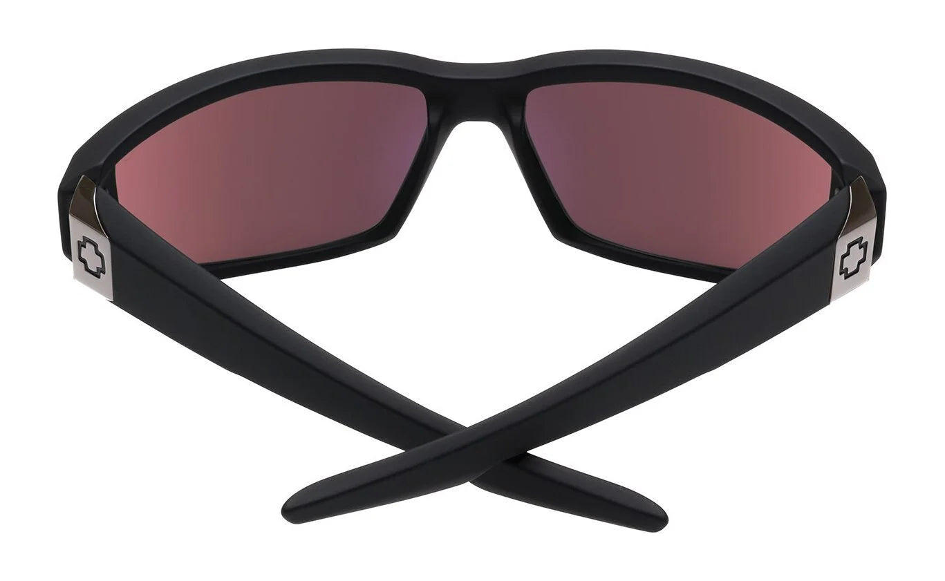 SPY DIRTY Mo Sunglasses, Size 61, feature black frames with red lenses and cross symbols on the arms. Viewed from the back, they offer Trident polarization for superior clarity. SPY DIRTY Mo Sunglasses, Size 61, feature black frames with red lenses and cross symbols on the arms. Viewed from the back, they offer Trident polarization for superior clarity.