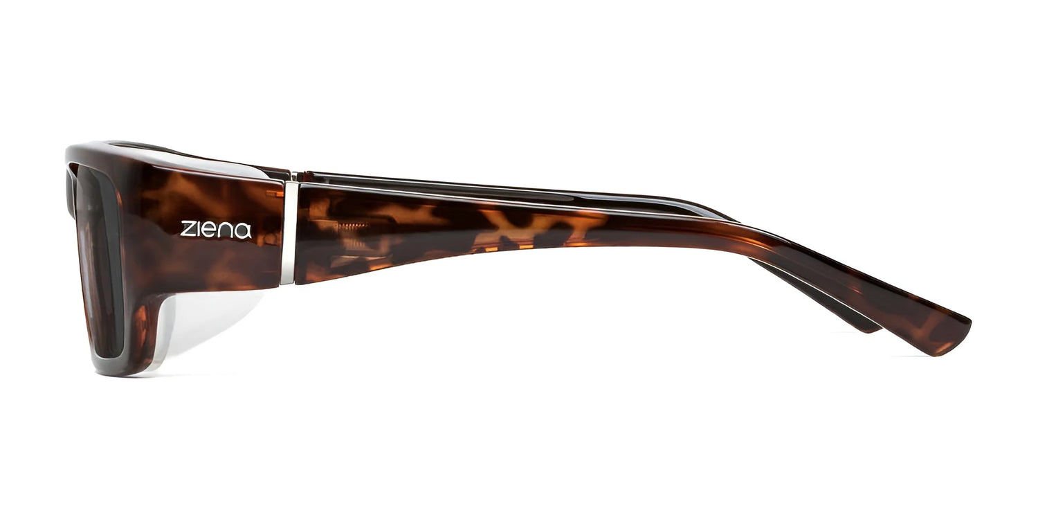 Side view of tortoiseshell Ziena Seacrest Sunglasses, Size 54, featuring Optical Clarity Lenses with the "Ziena" logo on the temple. Side view of tortoiseshell Ziena Seacrest Sunglasses, Size 54, featuring Optical Clarity Lenses with the "Ziena" logo on the temple.