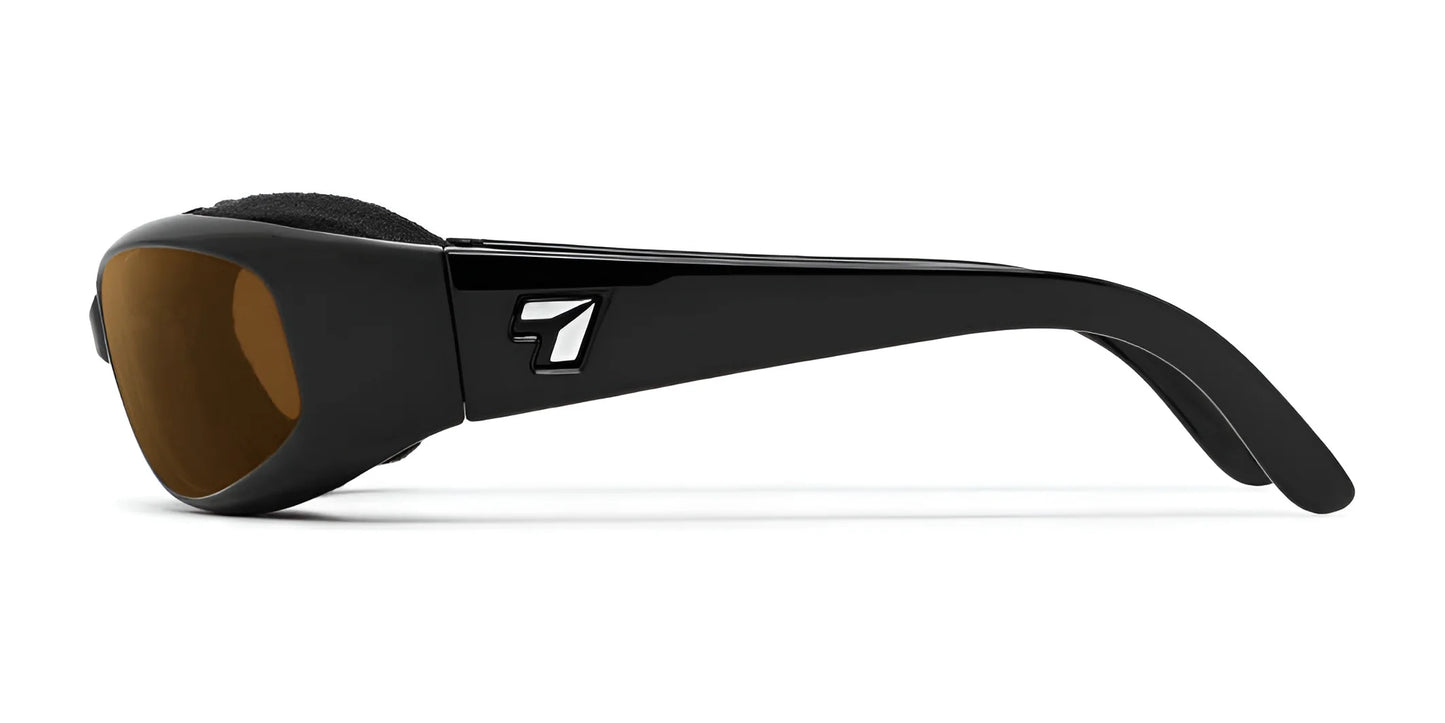 The 7eye Chubasco Sunglasses in size 61 feature a black frame with brown lenses and a logo on the side of the temple. They provide 100% UVA/UVB protection and include a Windproof AirShield for ultimate comfort.