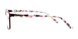 A side view of the DEA Preferred ACCERA Eyeglasses, size 58, showcases floral-patterned temples with chic shades of pink and white in a stylish Cat Eye design.