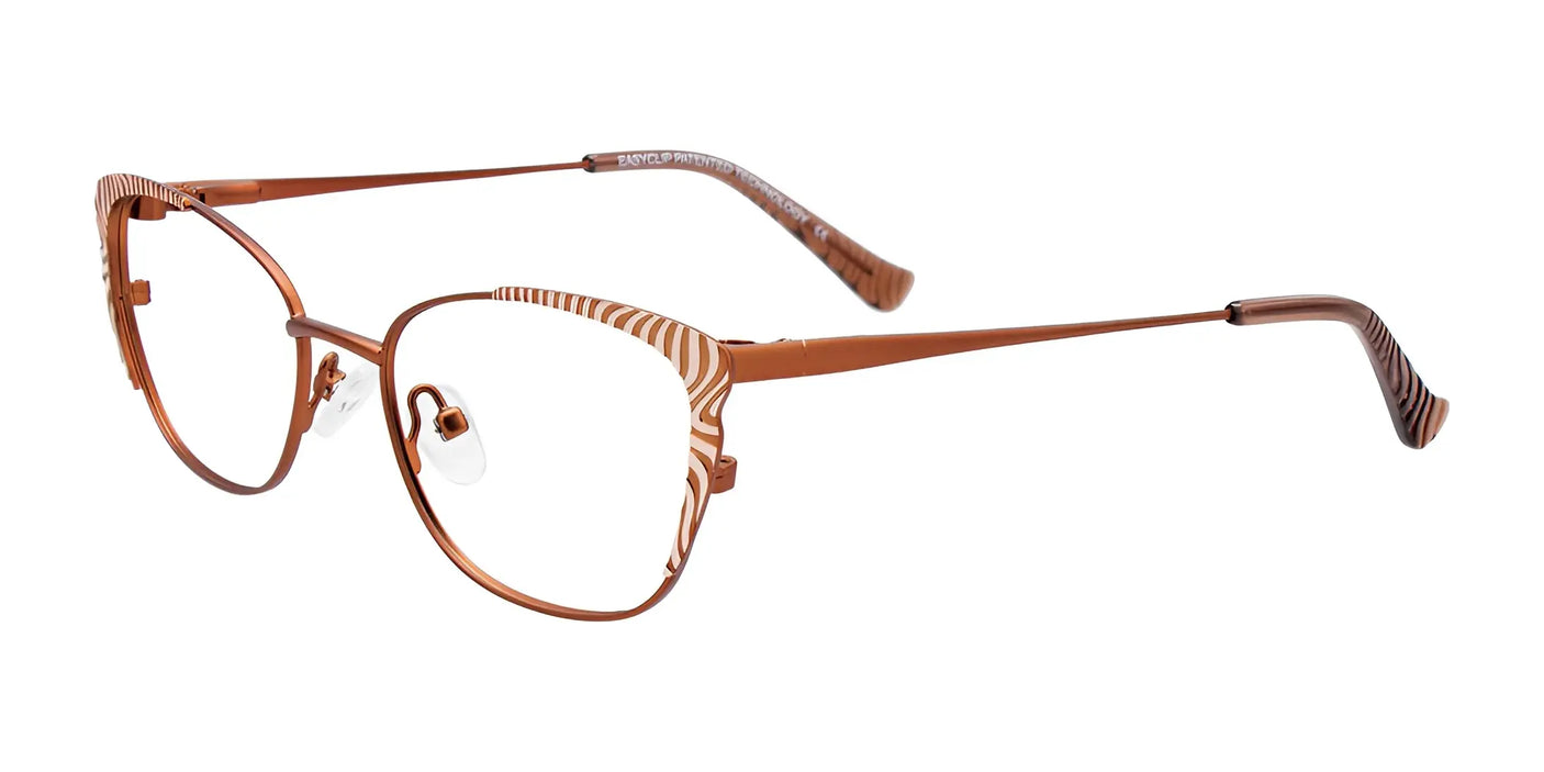 Introducing the EasyClip EC557 eyeglasses, a part of an exclusive EasyClip collection. These stylish brown and gold frames are adorned with a zebra pattern, while sleek, thin temples add an extra touch of sophistication. Plus, they feature clip-on sunglasses for added versatility. Available in size 50.