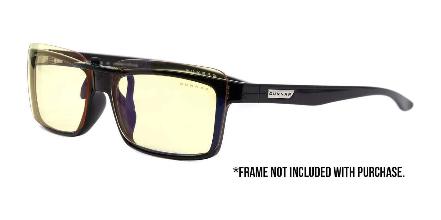 Introducing the Gunnar Clip On Computer Glasses, Size 60. These sleek black rectangular frames with yellow-tinted lenses feature advanced blue light blocking technology from Gunnar. Please note that the frame is not included with purchase.