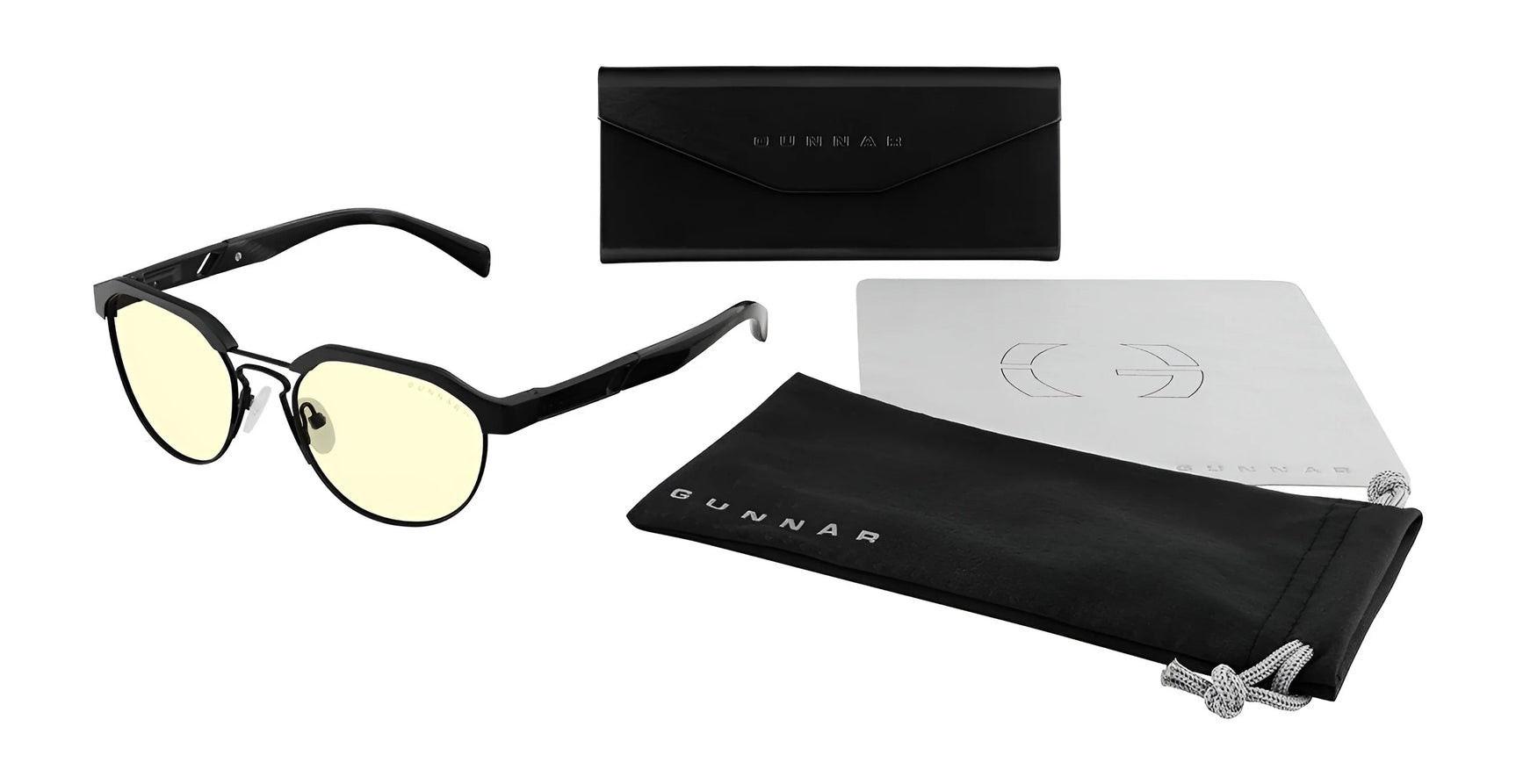The Gunnar Campbell Computer Glasses | Size 52 from Gunnar feature yellow lenses and a stylish frame. They come with a black case, pouch, and cleaning cloth on a white background. Made from hybrid materials for ultimate comfort, they provide blue light blocking protection.