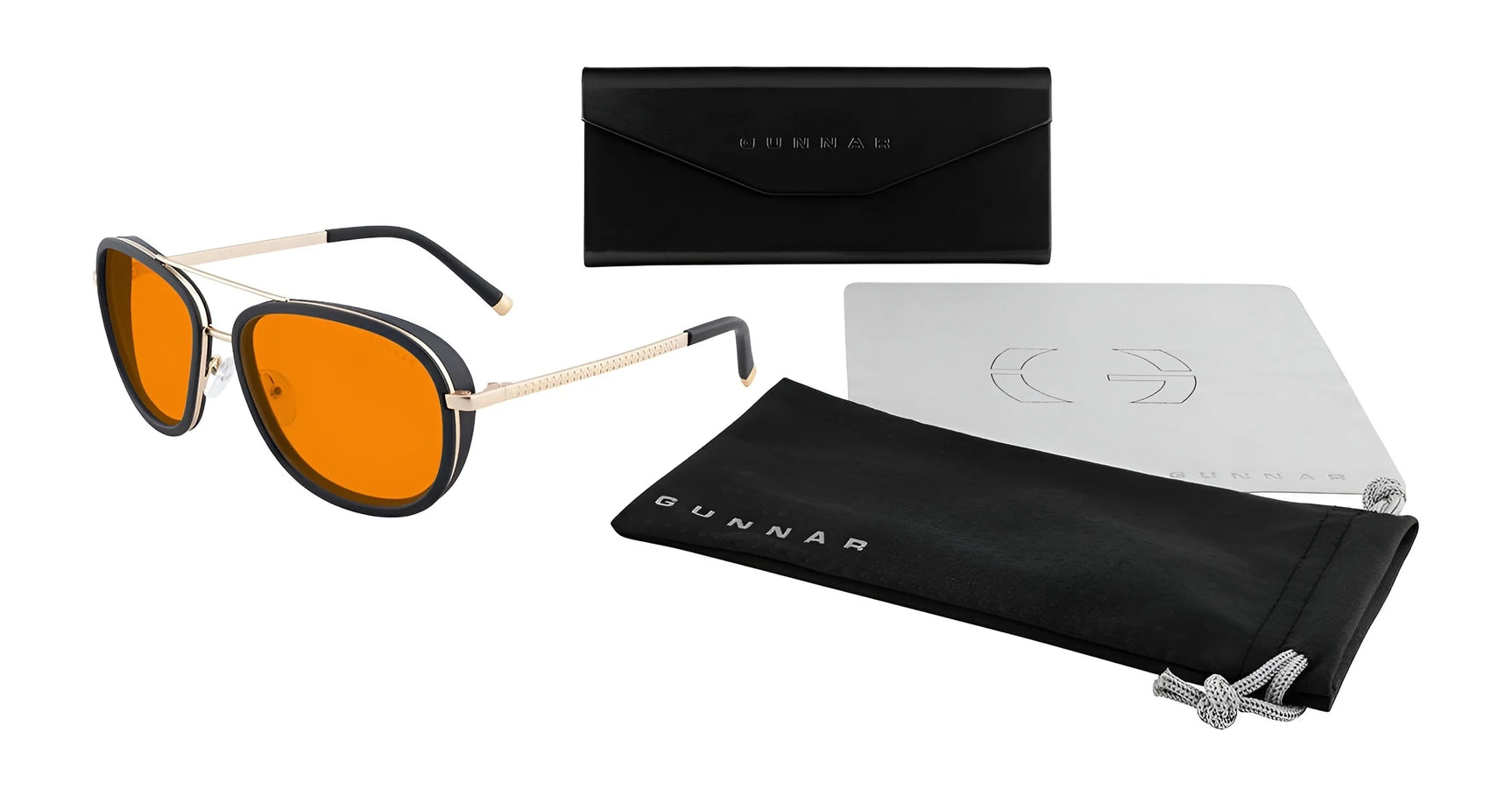 Gunnar Dume Computer Glasses feature orange lenses, a sleek black stainless steel aviator frame, and GUNNAR's blue light protection technology. Includes a black case, cleaning cloth, and pouch on a white background.