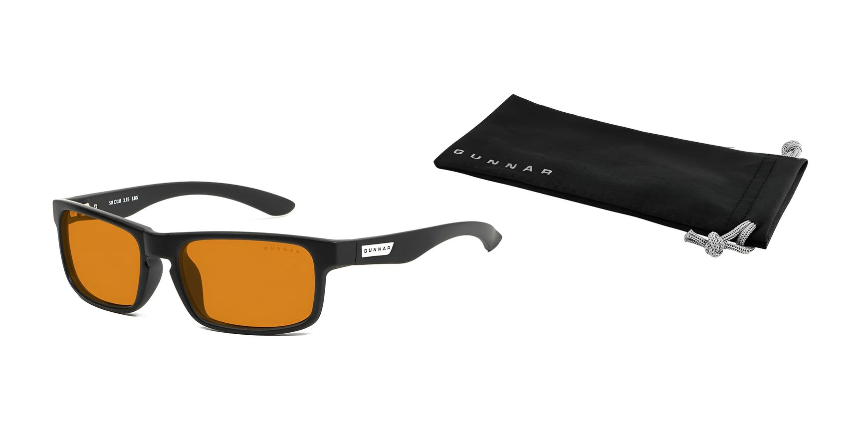 Gunnar's Enigma Computer Glasses feature orange lenses for advanced blue light blocking, perfect for gaming. The sleek black glasses, ideal for eye comfort, come with a soft case and are set against a white background.