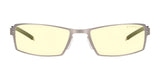 The Gunnar Sheadog Computer Glasses, size 56, feature stylish yellow-tinted lenses in a sleek metal frame. The brand name is elegantly etched on the lens. Made with GUNNAR material, they block blue light and ensure seamless headset compatibility for all-day comfort.