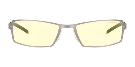 The Gunnar Sheadog Computer Glasses, size 56, feature stylish yellow-tinted lenses in a sleek metal frame. The brand name is elegantly etched on the lens. Made with GUNNAR material, they block blue light and ensure seamless headset compatibility for all-day comfort.