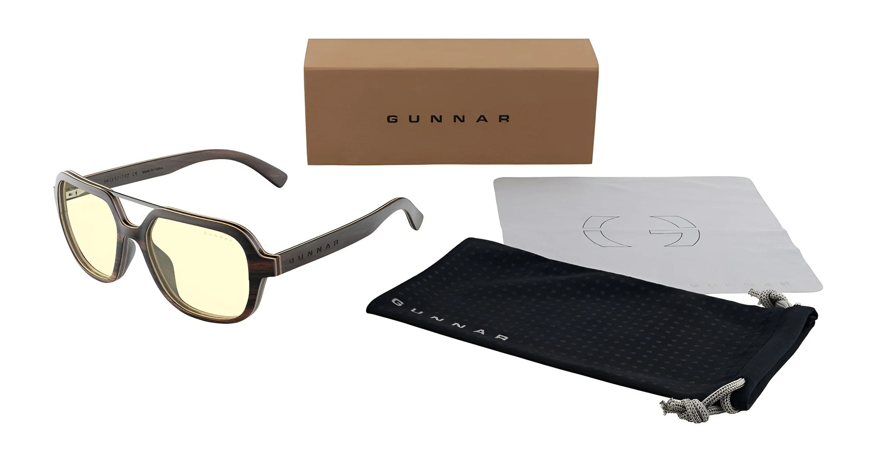 The Gunnar Humboldt Computer Glasses, size 54, from Gunnar feature advanced lens technology and come with a black pouch, cleaning cloth, and brown box. They are displayed on a white background.