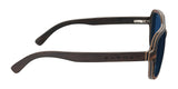 Gunnar Humboldt Sunglasses in Size 54 feature black frames made of thick carbon fiber and blue-tinted lenses, shown from the side on a white background.