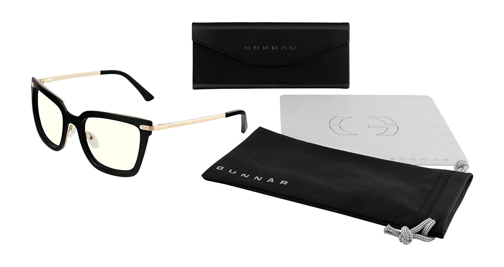 The Gunnar Kaia Computer Glasses in size 53, featuring GUNNAR lens technology, come with a sleek black case, cleaning cloth, and branded pouch. This elegant square design is crafted to combine function and style on a pristine white background.