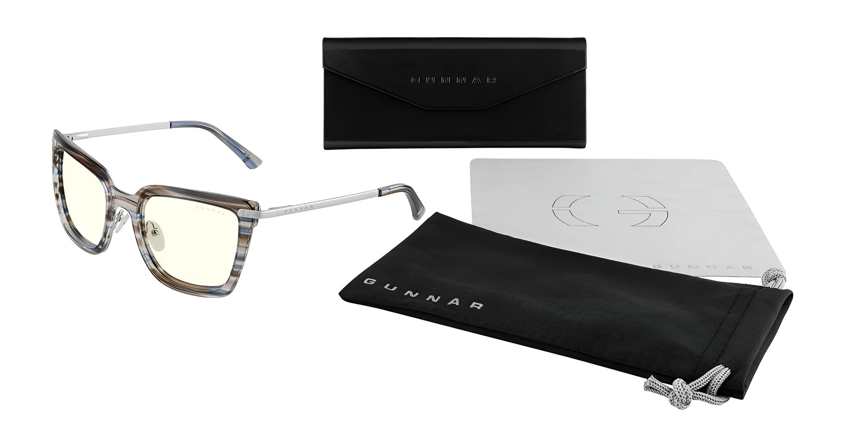 The Gunnar Kaia Computer Glasses, size 53, feature GUNNAR lens technology for optimal blue light blocking with their contemporary square gray frames. They include a lens cloth, black case, and soft pouch, all elegantly displayed on a white background.