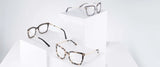 Three pairs of Gunnar Kaia Computer Glasses with square frames are showcased on white pedestals against a light background, highlighting innovative Gunnar lens technology designed for effective blue light blocking in modern digital lifestyles.