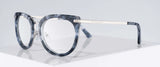 Gunnar Lahti Computer Glasses, size 51, in blue tortoiseshell with silver arms feature GUNNAR lens technology for optimal blue light blocking, rest on a white surface.