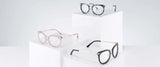 Four Gunnar Lahti Computer Glasses in size 51 are showcased on white stands, featuring sleek black and transparent frames. Each pair incorporates GUNNAR lens technology for enhanced blue light blocking, combining style with eye protection.
