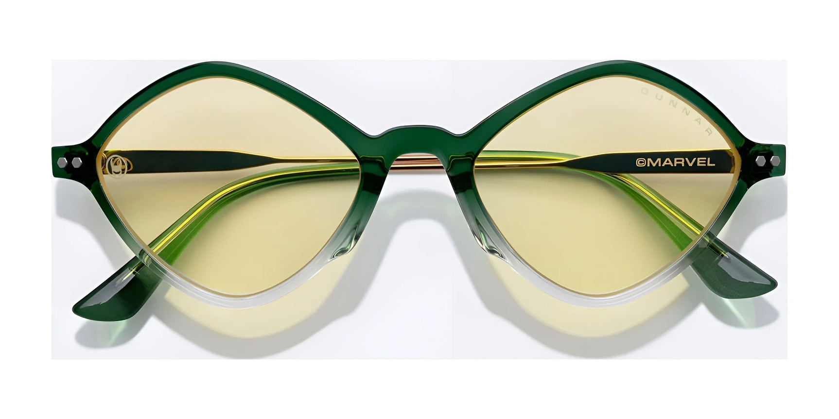 Explore the striking appeal of Gunnar Loki Asgard Edition glasses, showcasing green cat-eye frames, yellow-tinted lenses, and Marvel branding on the temples. Crafted from polymer with a G-Shield™ Plus coating for enhanced durability.