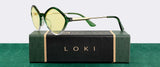 Green-tinted Gunnar Loki Asgard Edition Computer Glasses, size 53, elegantly feature gold accents on a box labeled "LOKI." With precision-engineered polymer and G-Shield™ Plus coating, these glasses offer ultimate durability.