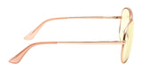 Side view of Gunnar Maverick Computer Glasses in rose gold with yellow-tinted lenses, thin metal arms, and anti-reflective coating for blue light protection.