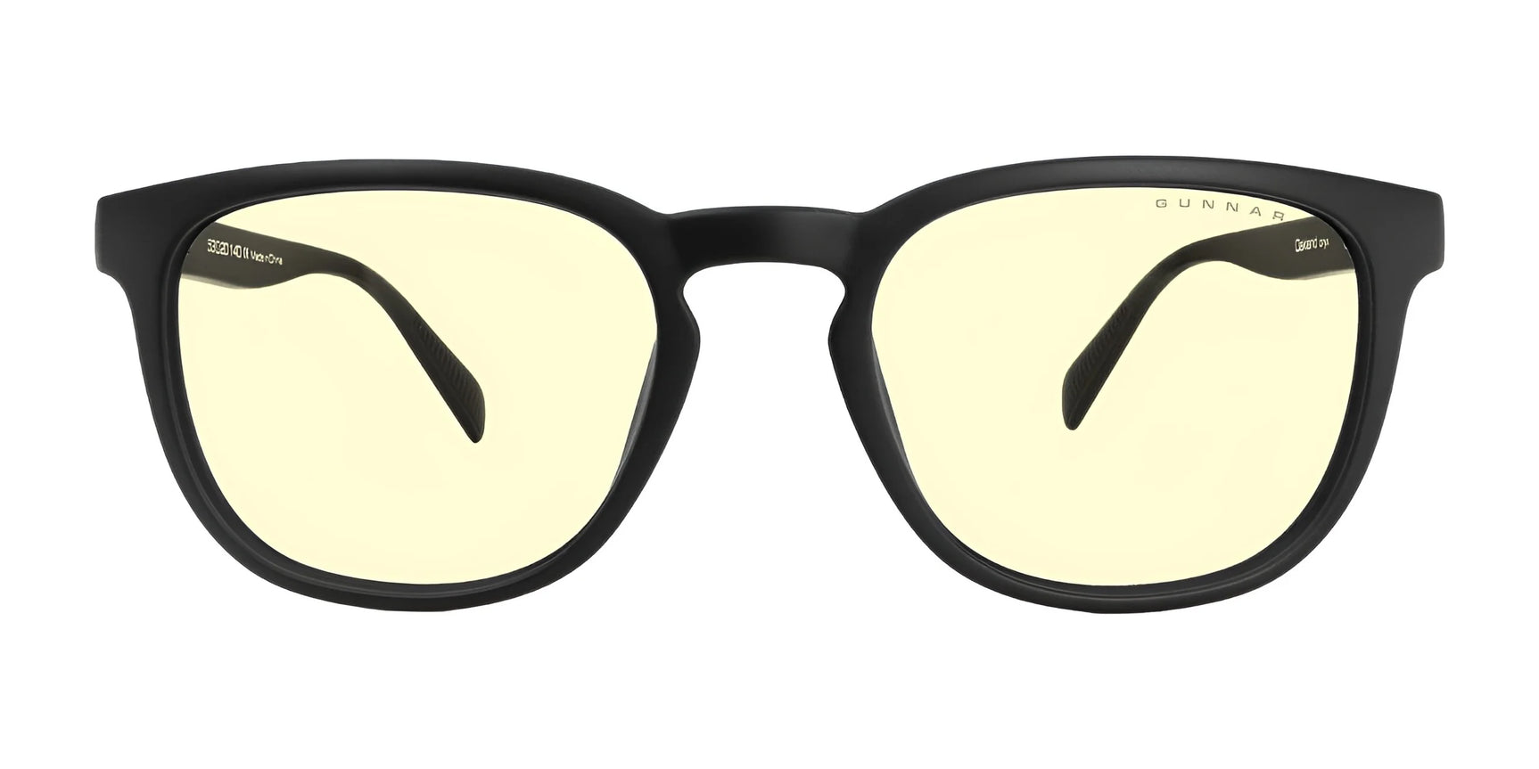 The Gunnar Oakland Computer Glasses, size 53, feature sleek black frames with yellow-tinted lenses designed for blue light protection. Made from durable nylon, these glasses rest elegantly against a white background, blending style and function effortlessly.