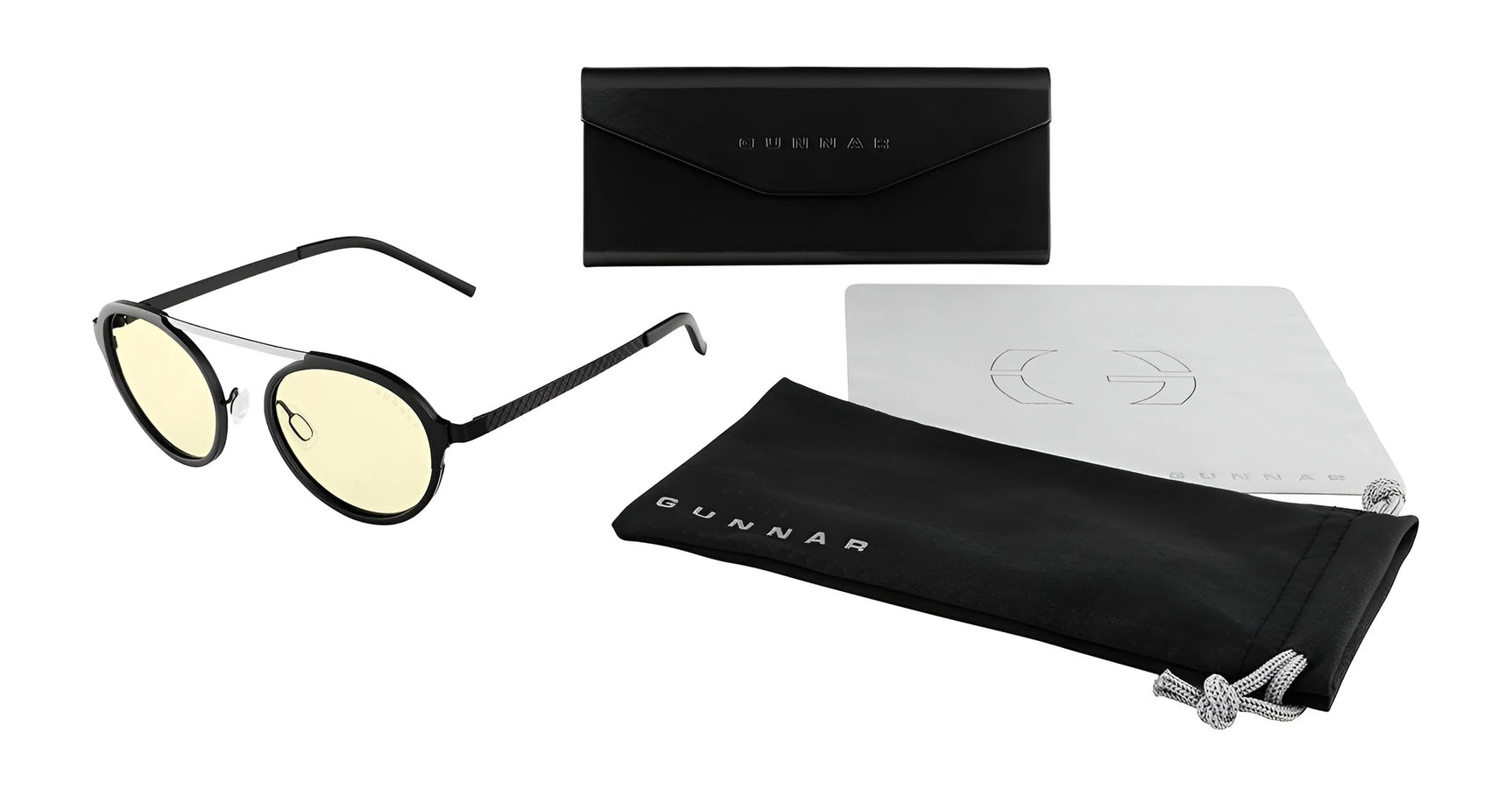 Gunnar Pacifica Computer Glasses | Size 50 have a minimalist design with round yellow lenses, accompanied by a black case, cleaning cloth, and branded pouch against a white background.