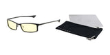 The Gunnar Phenom Reading Computer Glasses feature yellow-tinted lenses and black frames with advanced optics. They include a black drawstring pouch and a silver cleaning cloth, beautifully presented on a white background.