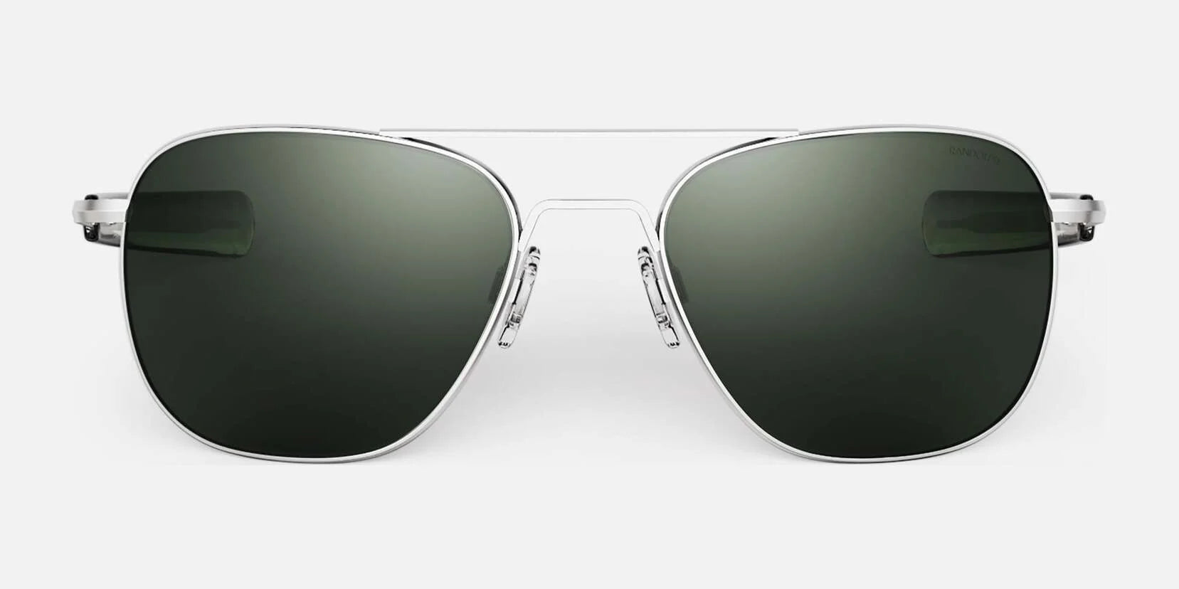 Randolph AVIATOR Sunglasses in size 58, featuring a silver frame and dark green lenses, designed to provide exceptional protection, expertly handcrafted in the USA against a plain background.