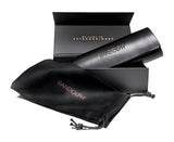 A black Randolph glasses case with a pouch, containing the Randolph AVIATOR Sunglasses in Size 58, is displayed inside an open box featuring the text "Welcome to Extraordinary." These sunglasses, handcrafted by Randolph in the USA, provide superior protection.