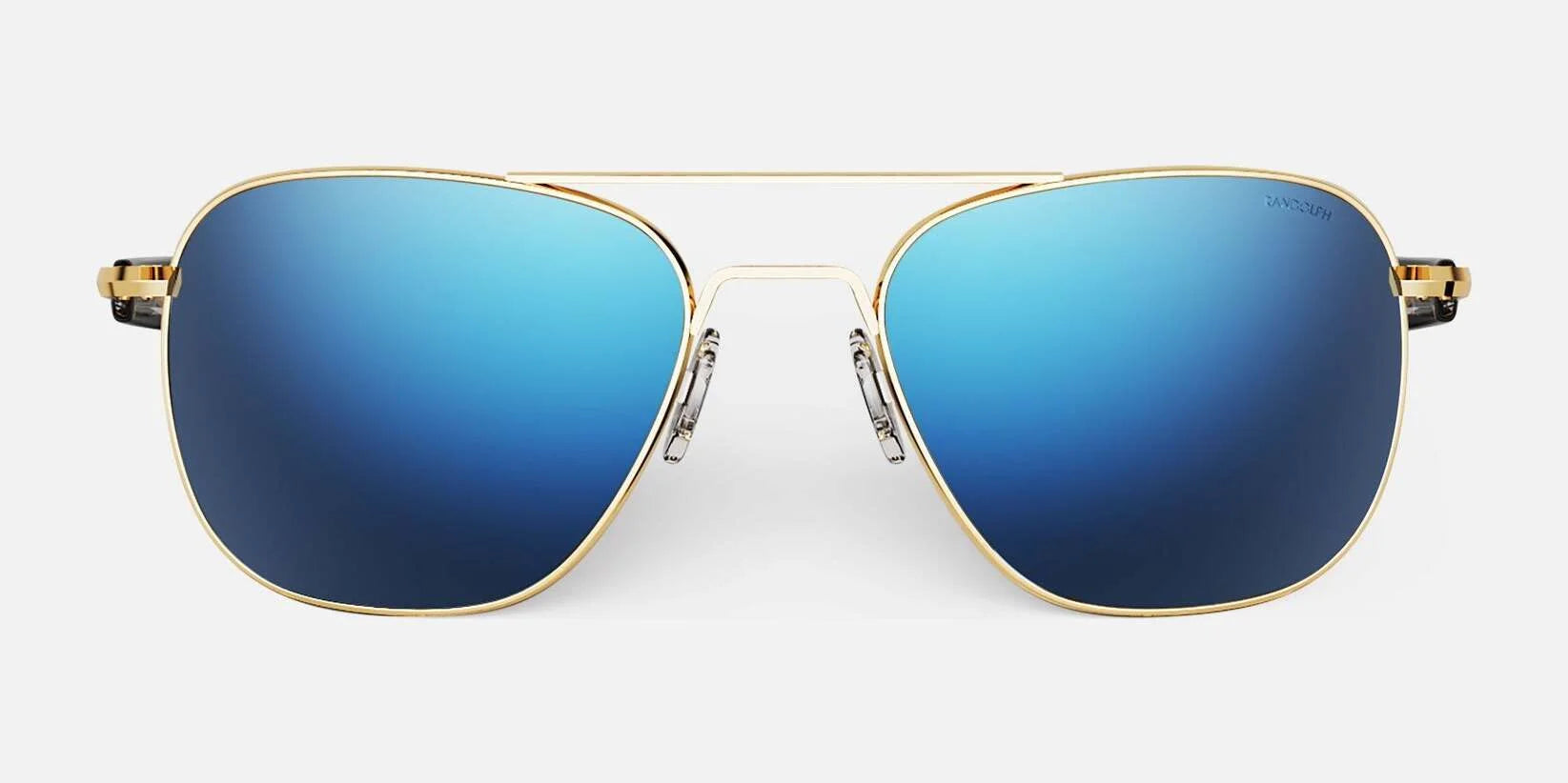 The Randolph AVIATOR Sunglasses in Size 58 showcase stunning blue mirrored lenses paired with elegant gold frames, providing excellent protection and a fashionable look. Made in the USA, these iconic aviators are designed to stand out in any setting.