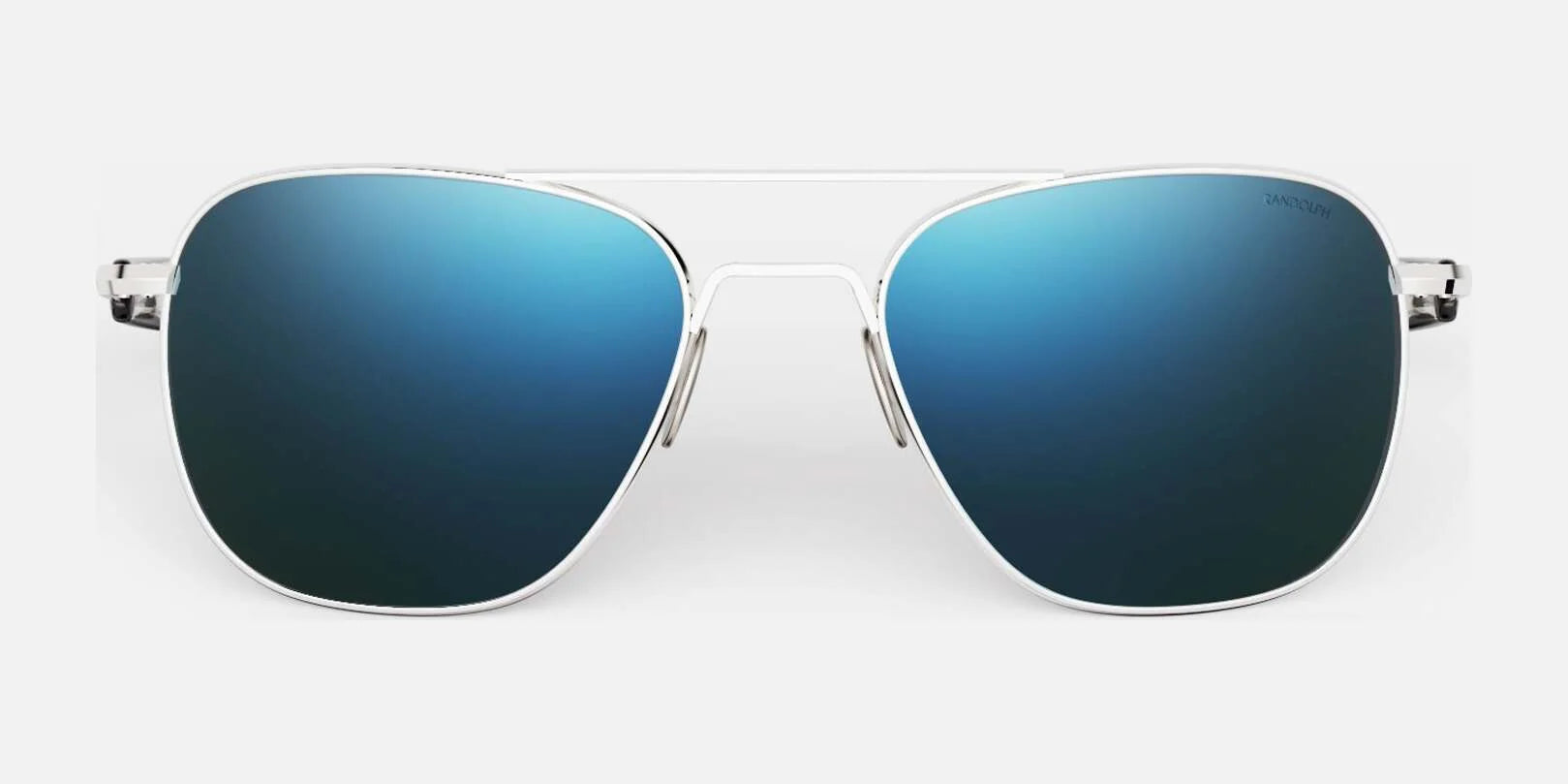 Embrace outdoor adventures with the Randolph AVIATOR Sunglasses, size 58. These aviator-style sunglasses feature blue-tinted lenses and a sleek silver frame, expertly designed by Randolph for superior protection while seamlessly blending style and functionality.