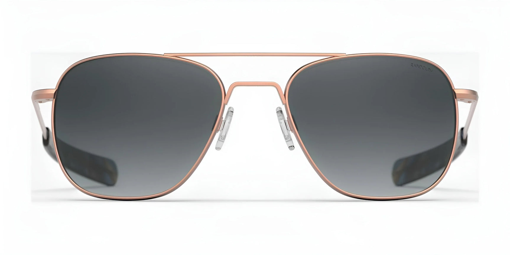 The Randolph AVIATOR Sunglasses in Size 58 feature a sleek rose gold frame with dark lenses, providing excellent protection, and are stylishly displayed on a white background.