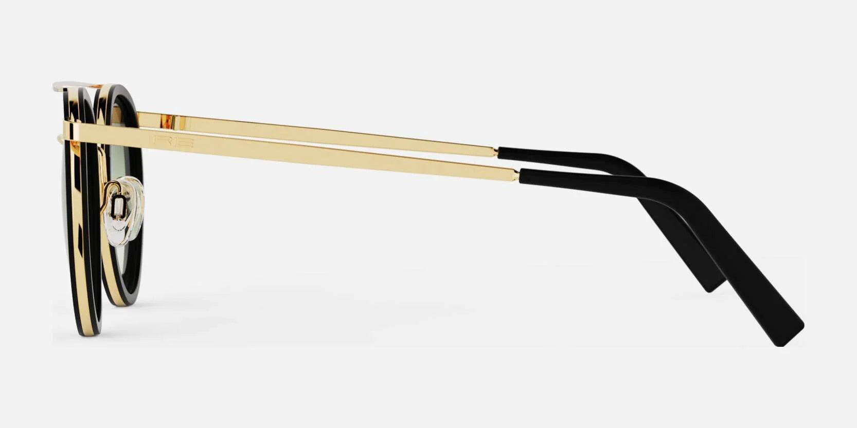 Side view of stylish Randolph P3 FUSION Sunglasses | Size 51 with gold metal frames and black temple tips, crafted from high-quality materials and offering UV protection, against a white background.