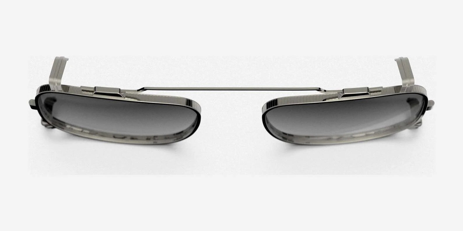 Rectangular Randolph x BKC P-51 Clip-On Prescription Sunglasses with a thin metal frame, a connecting bridge on top, and dark lenses set against a white background.