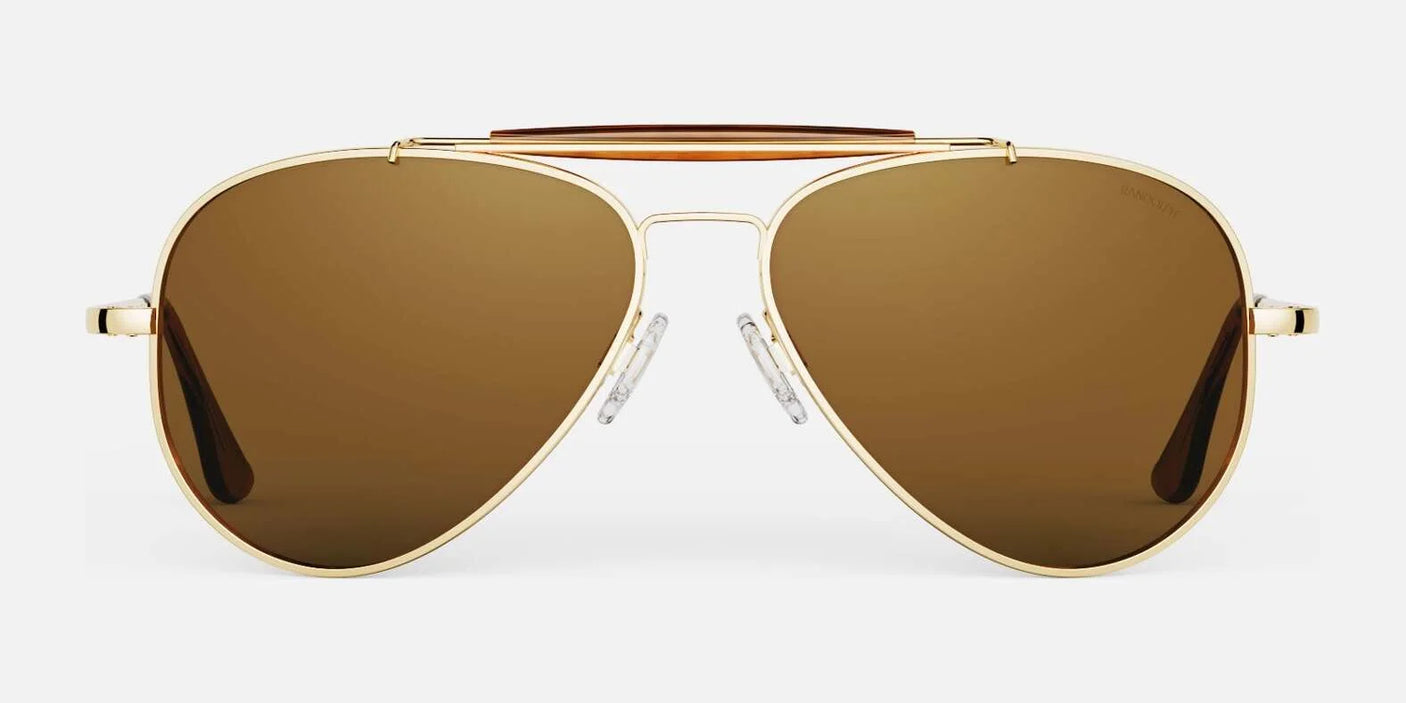 The Randolph SPORTSMAN Sunglasses, featuring gold frames and brown lenses, are ideal for UV protection during outdoor adventures and are displayed on a white background.