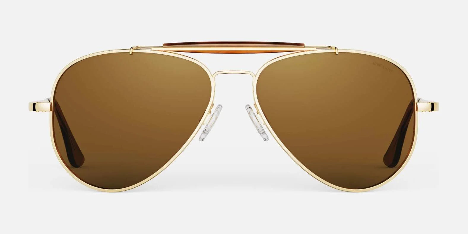 The Randolph SPORTSMAN Sunglasses, featuring gold frames and brown lenses, are ideal for UV protection during outdoor adventures and are displayed on a white background.