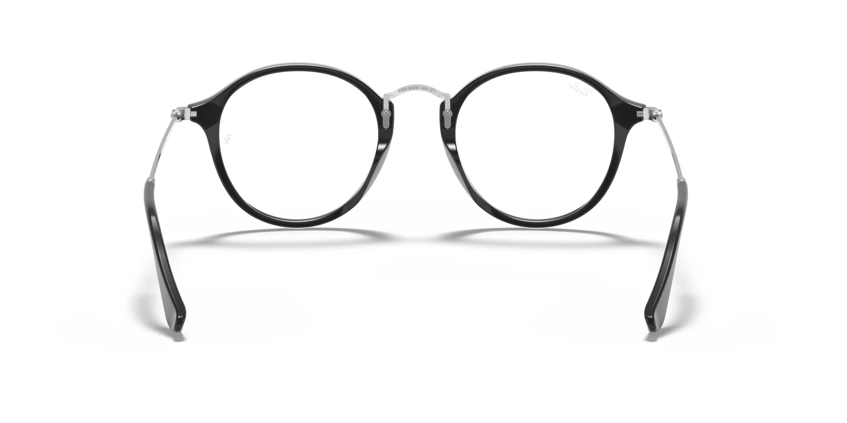 The Ray-Ban ROUND RX2447V Eyeglasses, size 49, feature black-rimmed round frames with clear lenses, elegantly presented from the front against a white background.