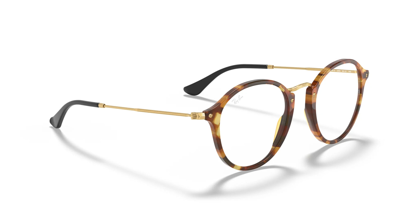 The Ray-Ban ROUND RX2447V eyeglasses, size 49, showcase tortoiseshell round frames complemented by gold temples and black tips, perfectly capturing the timeless Ray-Ban aesthetic against a pristine white backdrop.