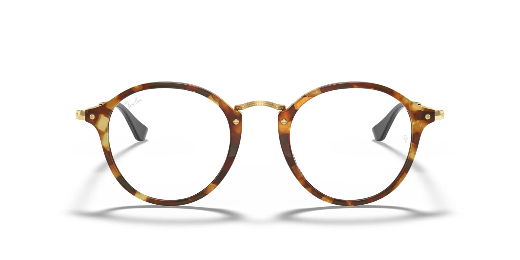 The Ray-Ban ROUND RX2447V Eyeglasses, featuring a stylish round tortoiseshell design with a gold bridge, highlight the timeless elegance of Ray-Ban eyewear against a white background, viewed from the front.