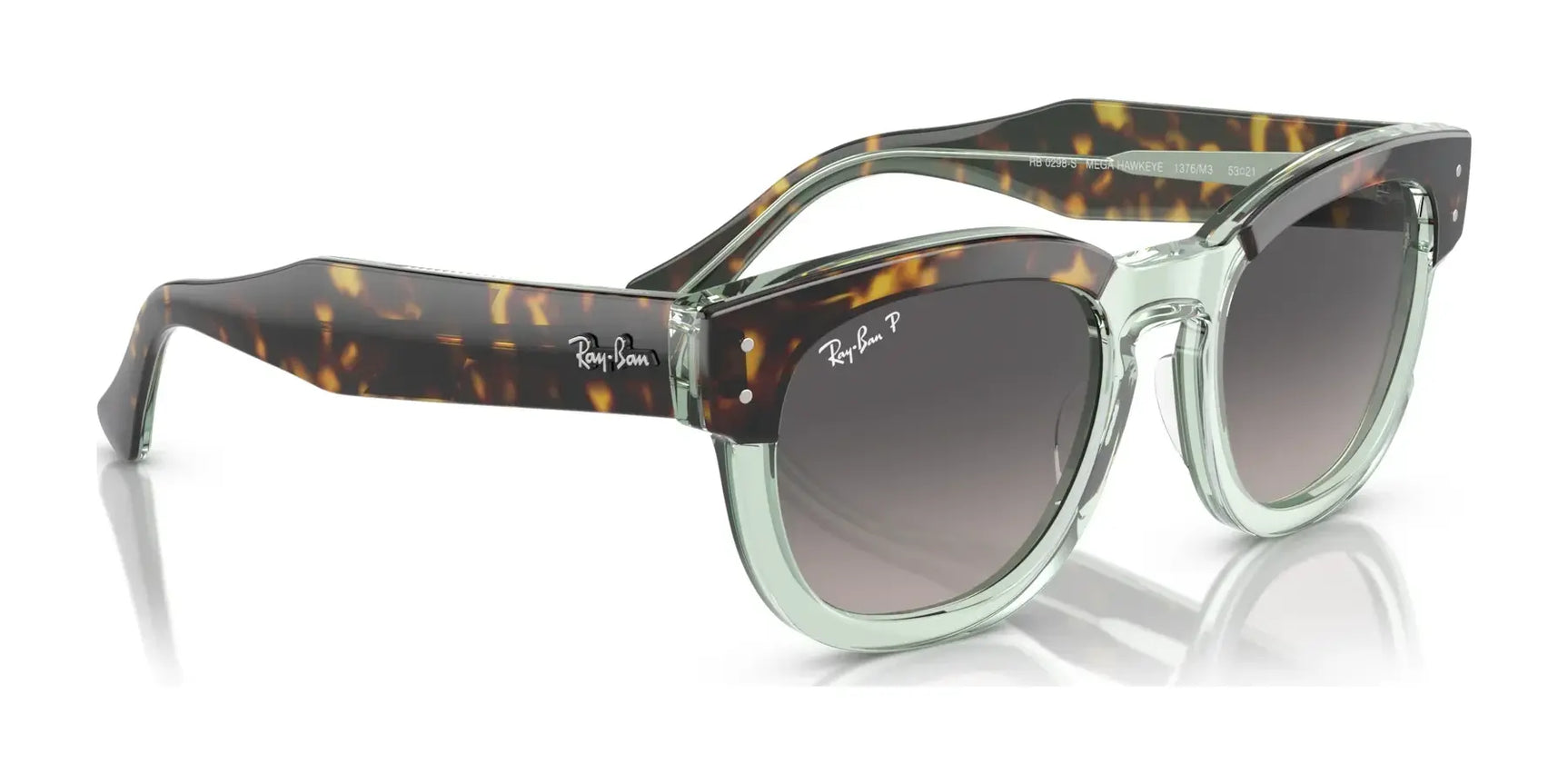 These Ray-Ban MEGA HAWKEYE RB0298S sunglasses showcase bold acetate tortoiseshell frames with gray gradient lenses, offering a stylish and sophisticated look.