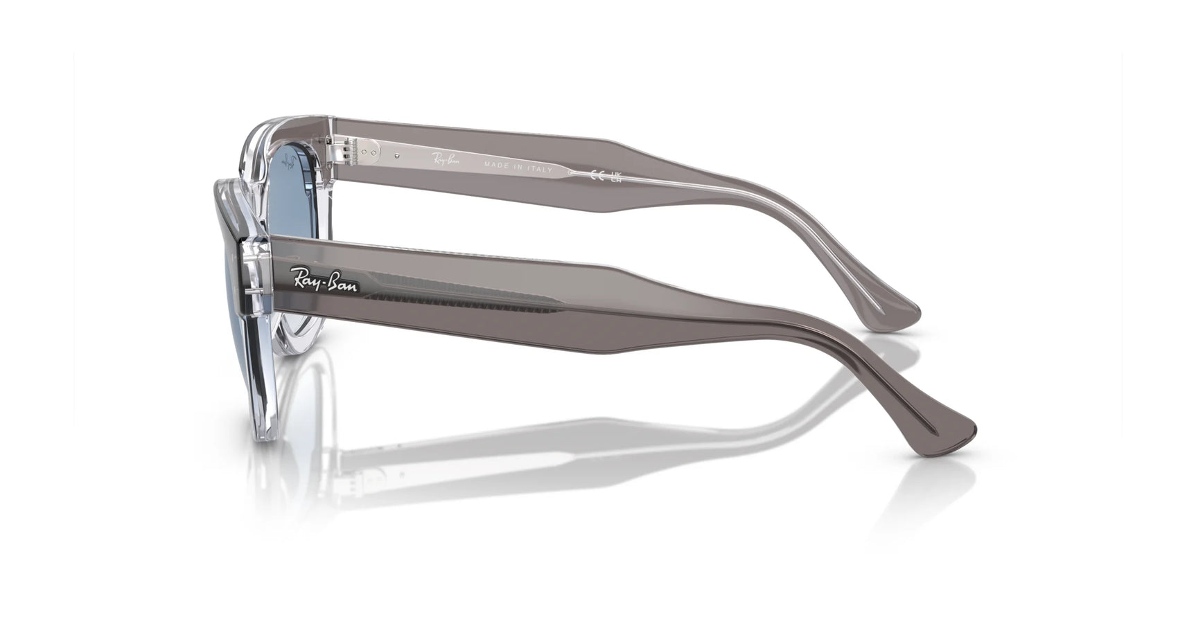 Side view of Ray-Ban MEGA HAWKEYE RB0298SF sunglasses in translucent gray, size 53, showcasing a sleek square acetate frame with the "Ray-Ban" logo on the arm.