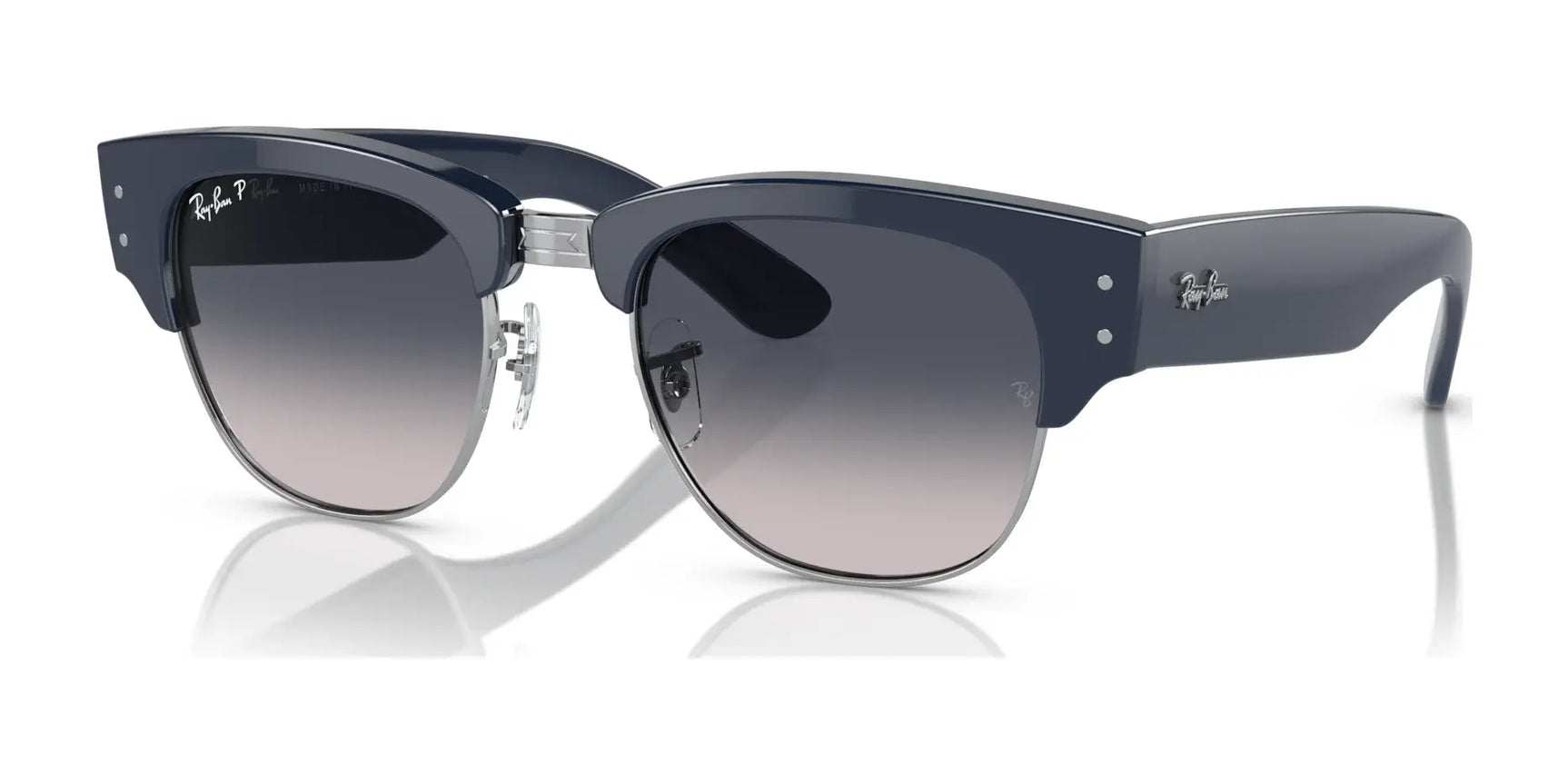 The Ray-Ban MEGA CLUBMASTER RB0316S sunglasses feature square frames, blue on silver color scheme, gradient lenses, and a sleek silver bridge with the brand logo on the temples.