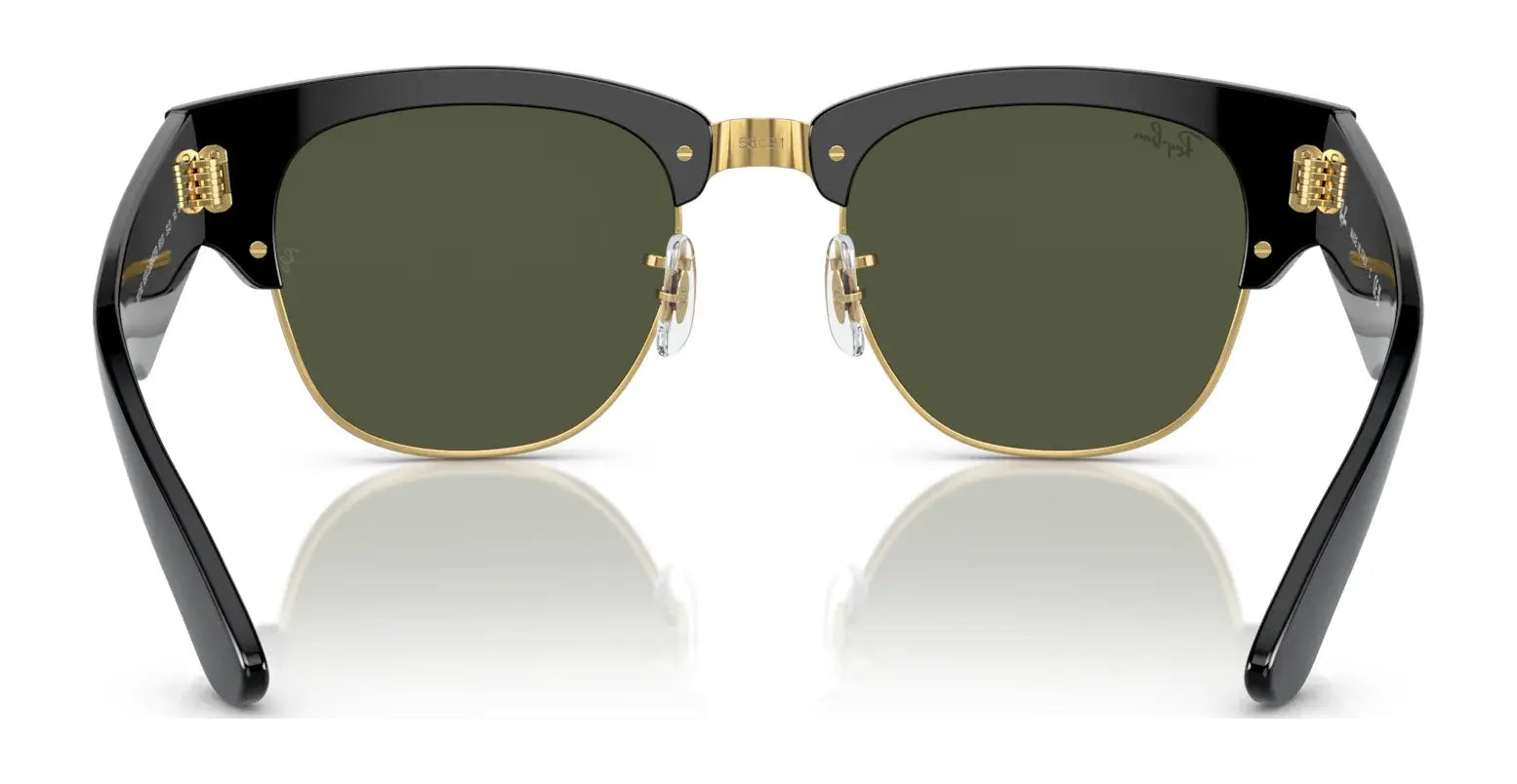 The Ray-Ban MEGA CLUBMASTER RB0316S Sunglasses offer a stylish front view with black frames and gold accents, ideal for those seeking contemporary eyewear.