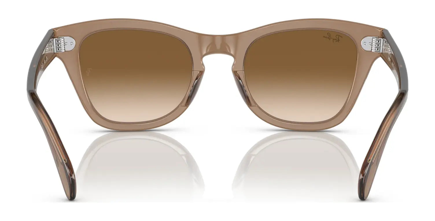 Ray-Ban RB0707S sunglasses with gradient lenses and an acetate frame, shown from behind on a reflective surface.